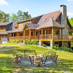 Creekfront Log Mansion with Heated Pool sleeps 28