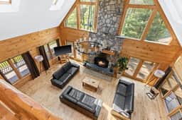Creekfront Log Mansion with Heated Pool sleeps 28