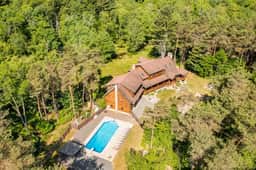 Creekfront Log Mansion with Heated Pool sleeps 28