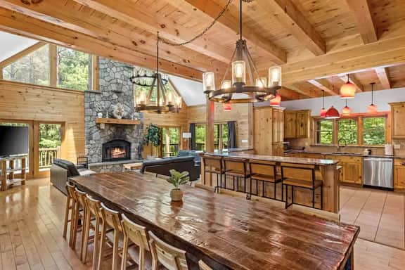 Creekfront Log Mansion with Heated Pool sleeps 28